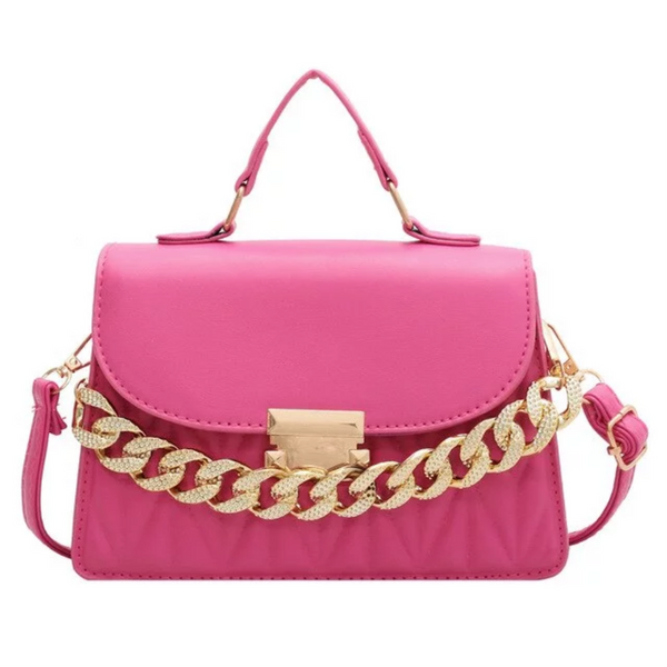 Roze handtas met gouden ketting, elegant design, damesmodeaccessoire, trendy schoudertas, perfecte keuze voor stijlvolle outfits.