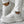 Witte damessneakers met bloemenpatroon en dikke zool, gecombineerd met gouden enkelketting. Modieuze sportschoenen voor casual en sportieve outfits.