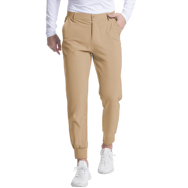 Beige herenbroek, sportief design, elastische tailleband, geschikt voor casual en actieve gelegenheden. Comfortabele pasvorm, trendy stijl.
