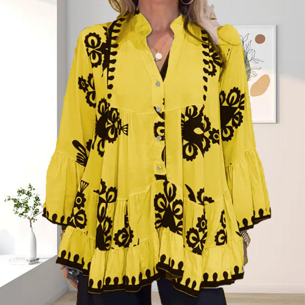 Heldere gele blouse met zwarte bloemenprint, wijde mouwen en knoopsluiting. Modieuze dameskleding, perfect voor casual en zomerse outfits.