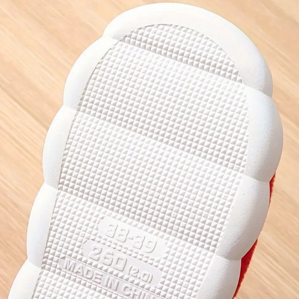 Witte rubberen zool van een sneaker, met geribbelde textuur en maatmarkering 260 mm. Populair voor comfort en grip. Gemaakt in China.