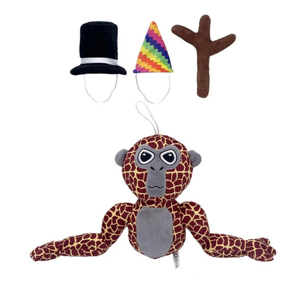 Pluche gorilla met luipaardprint, inclusief accessoires: hoge hoed, regenboog feesthoed en takvormig object. Perfect speelgoed voor kinderen.