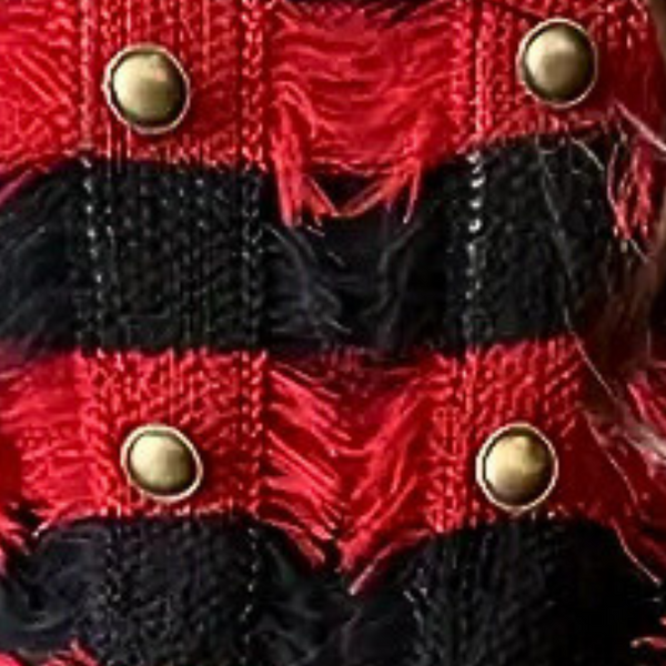 Rood-zwarte geruite stof met gouden knopen, textielontwerp, close-up. Modieuze stof, textuur, kledingmateriaal, gedetailleerd patroon.