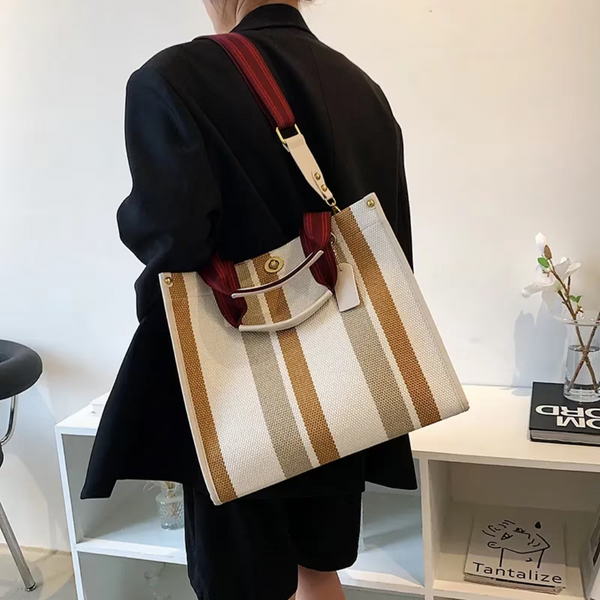 Dames handtas met geel-witte strepen en rode schouderband, stijlvolle modeaccessoire, perfect voor dagelijks gebruik en trendy outfits.